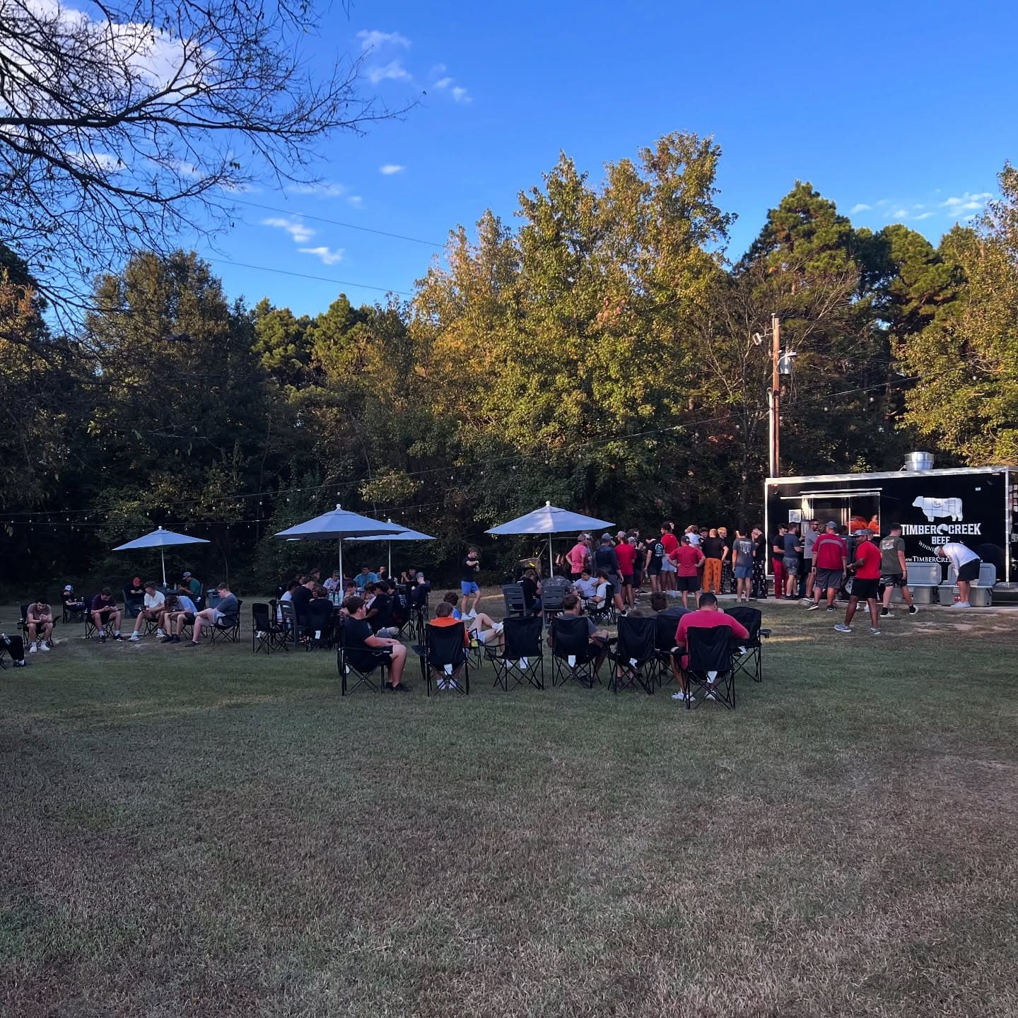 Guests gathered around Timber Creek Food Truck at an East Texas event